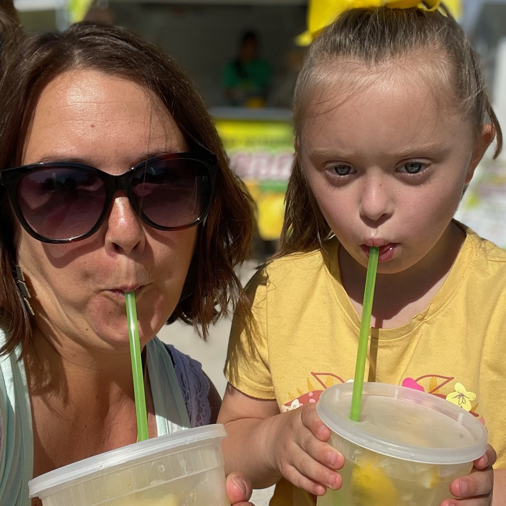 My daughter Charlie with my friend Kacie enjoying lemonade