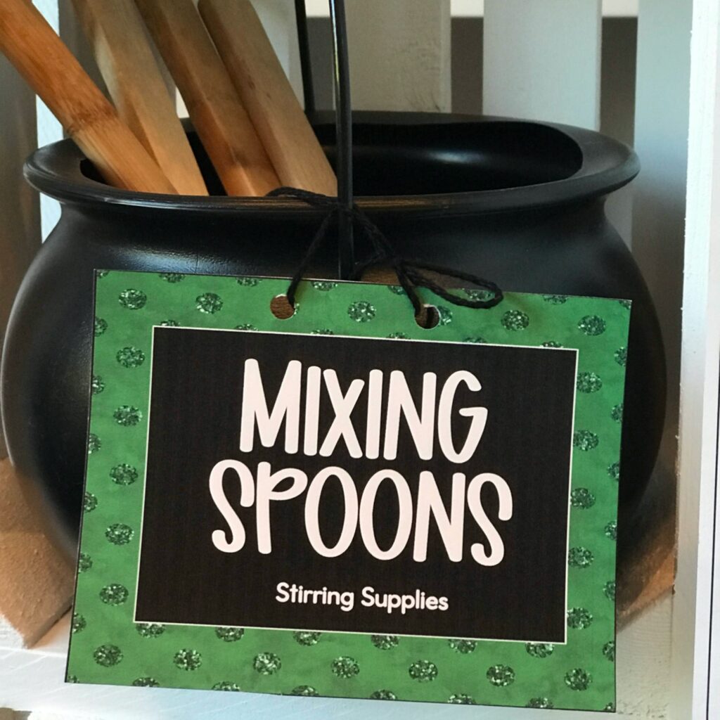 Halloween dramatic play mixing spoons